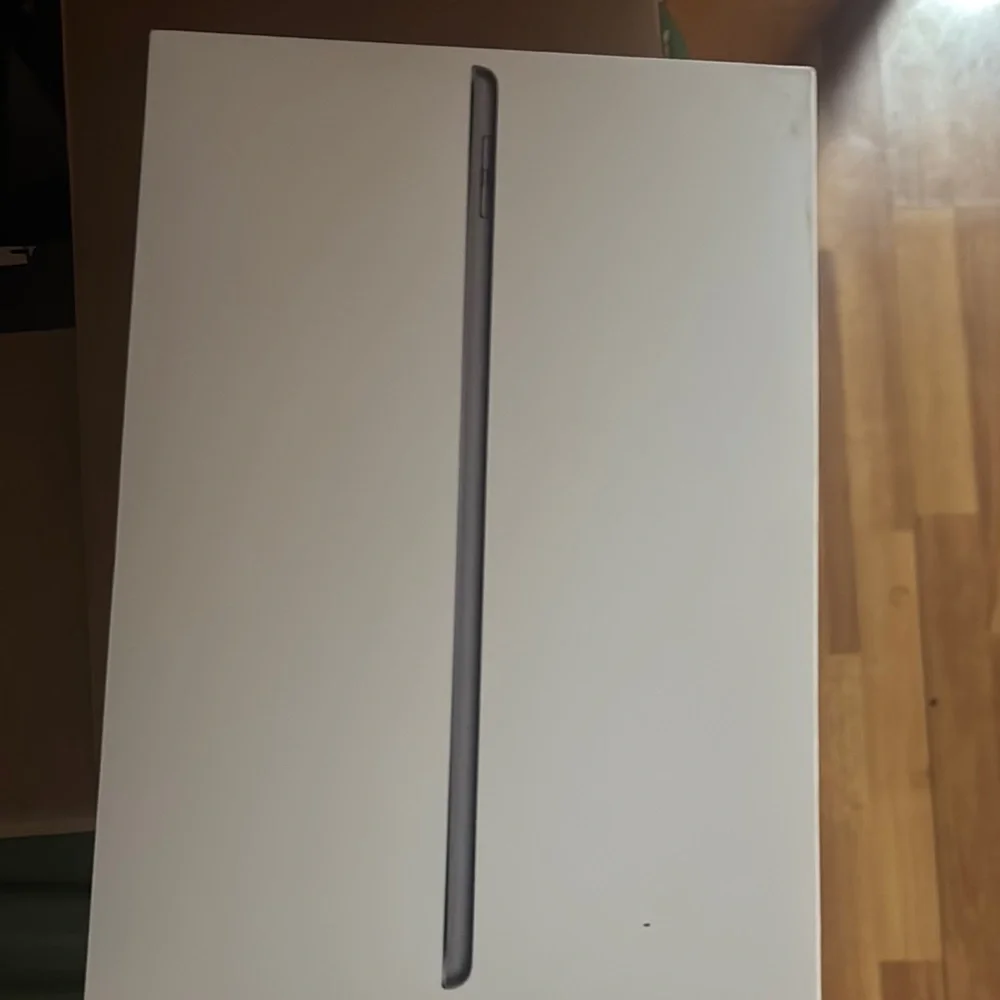 Apple Black Tablet with Reflective Screen and Rounded Corners